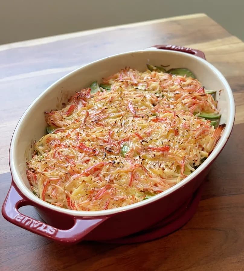 Quick and easy sushi bake with rice, crab, avocado, furikake, masago, and sriracha — ready to scoop onto a sheet of nori
