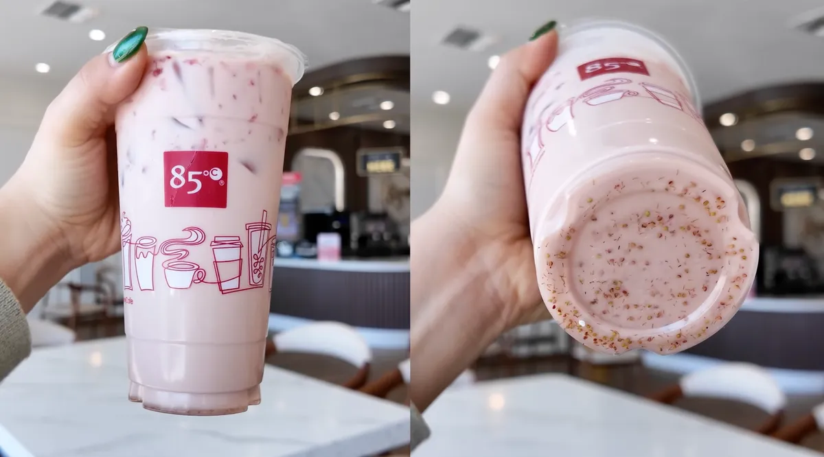 Split shot of the 85°C Bakery fresh strawberry milk tea in cup and top-down view of the pink drink surface
