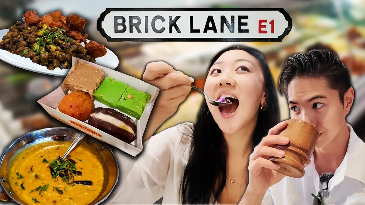 Jasmine and George eating Indian food on Brick Lane in London