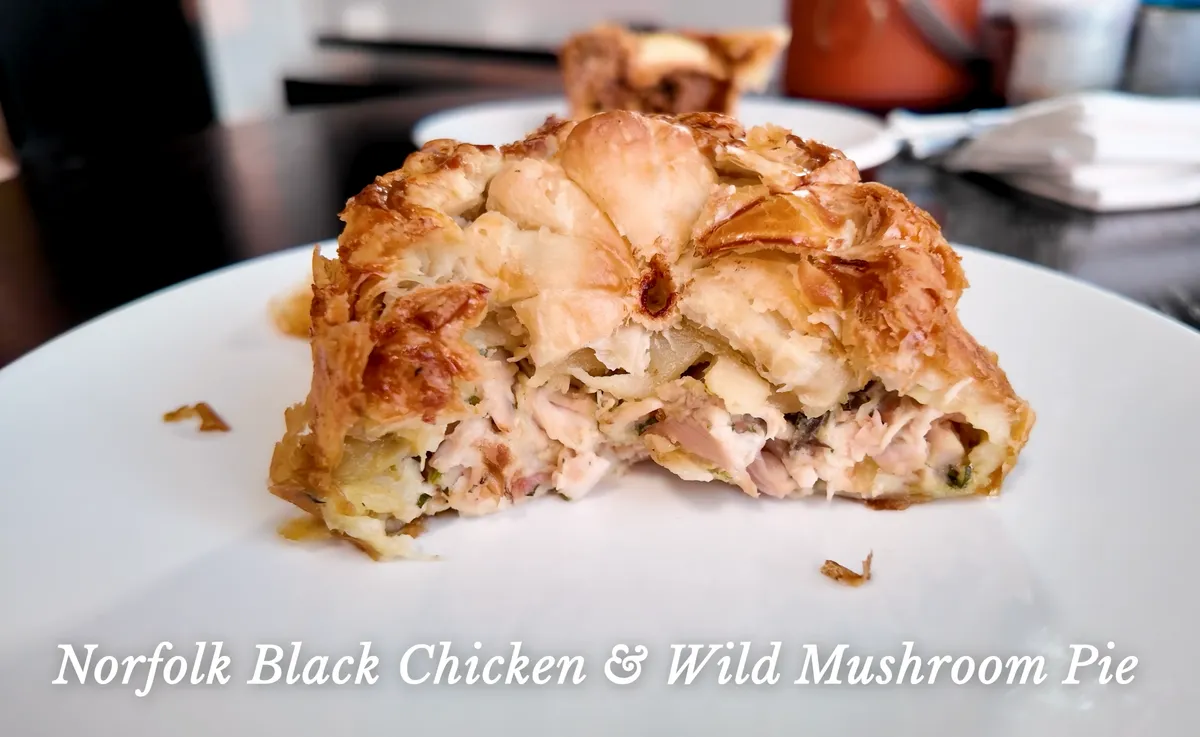 The Pie Room Norfolk Black Chicken and Wild Mushroom Pie cross-section with creamy herb filling